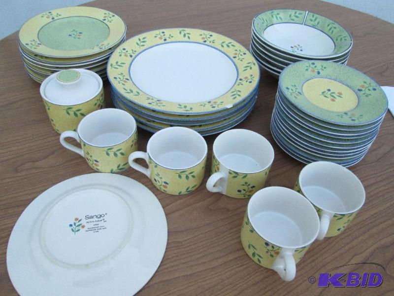 Sango dinnerware set various counts on the va...