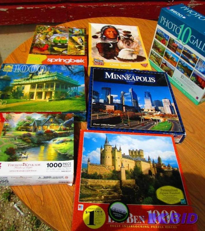 Lot of 500 and 1000 piece puzzles, all comple...