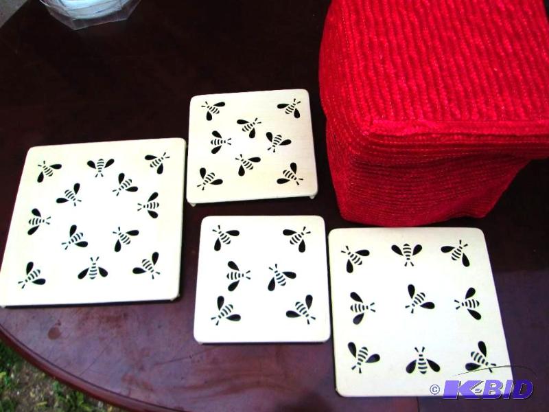 Lot of metal hot pan holders and a woven bask...