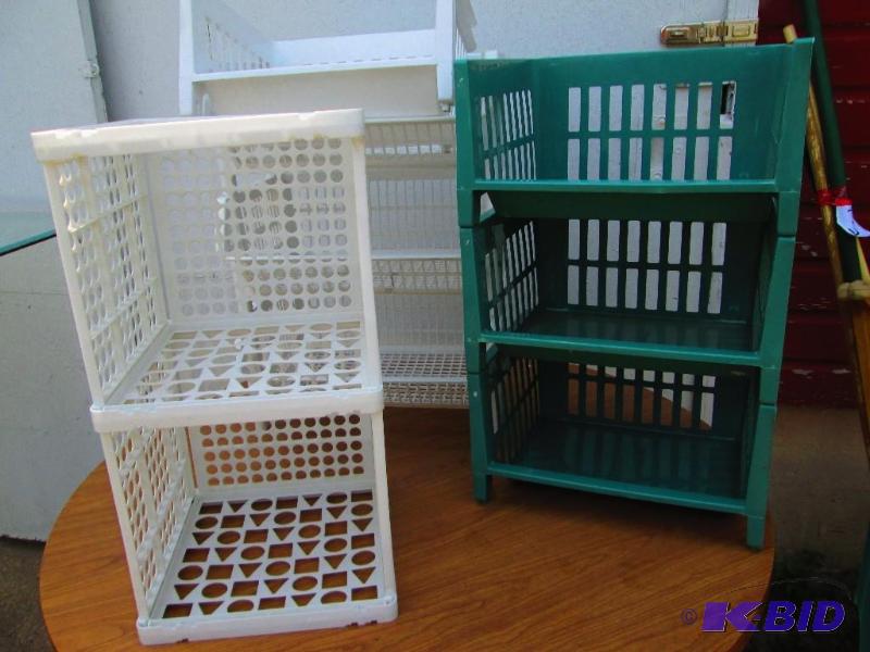 Lot of plastic storage containers and stackin...