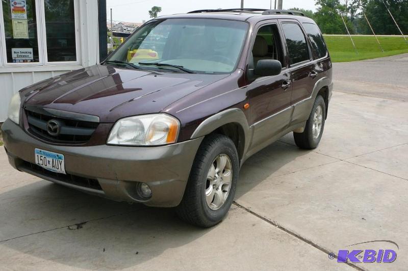 lot 1 image: Year 2002 Make Mazda Model Tribute Vehicle...