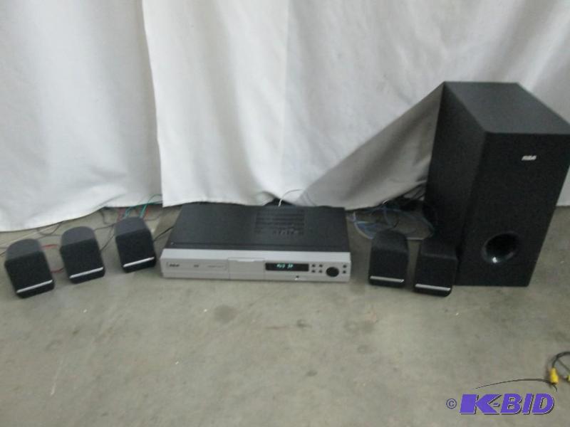 lot 4 image: RCA DVD Home Theater w iPhone iPad iPod Dock
