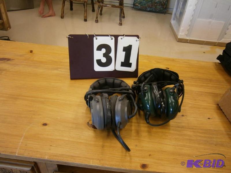 (1) Delex, (1) Avcomm aircraft headsets....