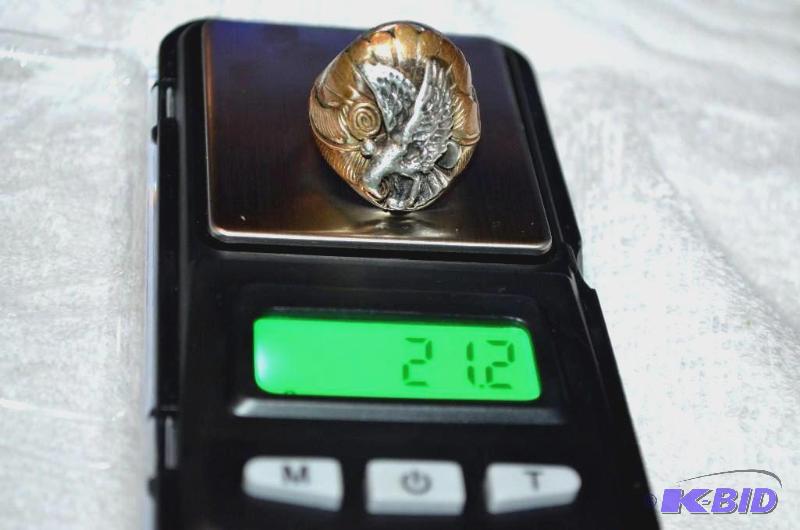 lot 1 image: 21.2 Gram Heavy Ring. We think it could be 14...