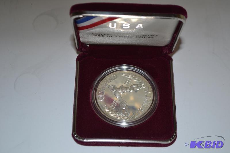 lot 28 image: Silver Olympic coin United States Mint 1988 Olympic...