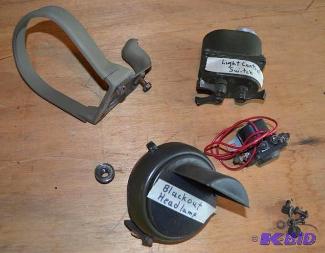 lot 40 image: Electrical Parts for 1971 M151A2 Army Jeep- B...
