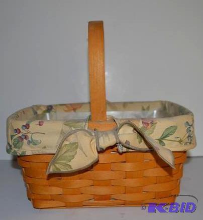 lot 49 image: Longaberger Hand woven basket with floral pri...