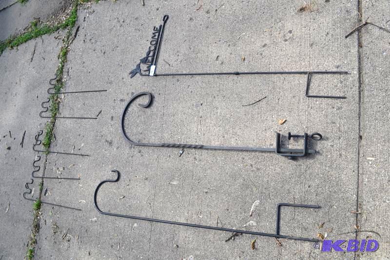 lot 76 image: Wrought iron shepherds hook for hanging baske...