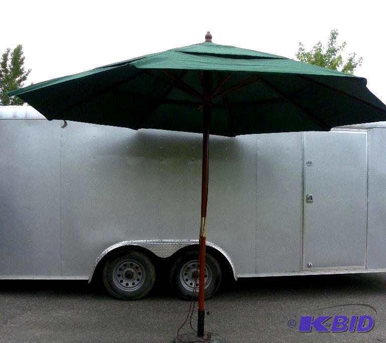 lot 27 image: 11 foot 3 Tier Umbrella, Hunter Green, 3 sect...