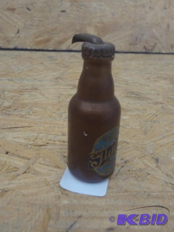 lot 122 image: Rare Wooden Gluek Beer Bottle Opener...