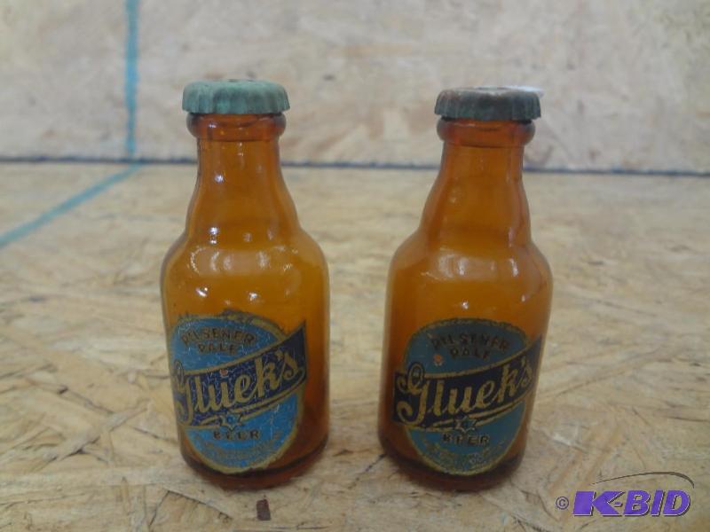 lot 128 image: Pair Of Gluek Glass Bottle SaltPepper Shaker...