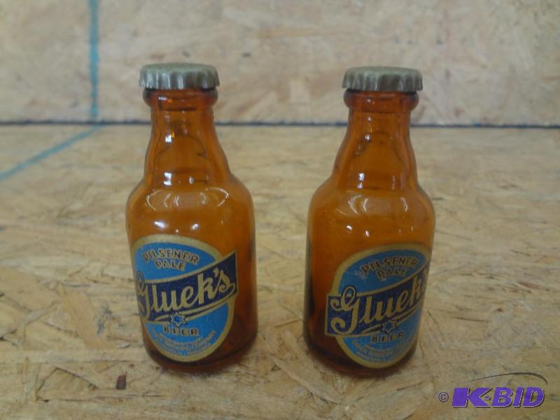 lot 129 image: Pair Of Gluek Glass Bottle SaltPepper Shaker...