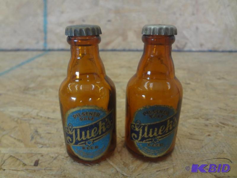 lot 130 image: Pair Of Gluek Glass Bottle SaltPepper Shaker...