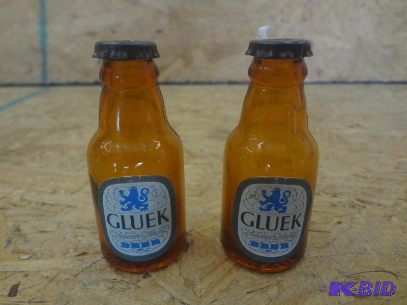 lot 131 image: Pair Of Gluek Glass Bottle SaltPepper Shaker...