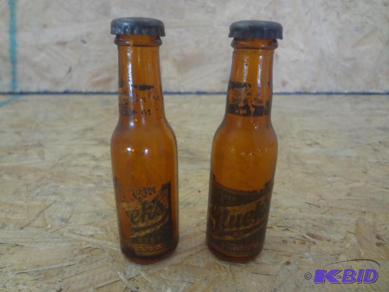 lot 132 image: Pair Of Gluek Glass Bottle SaltPepper Shaker...