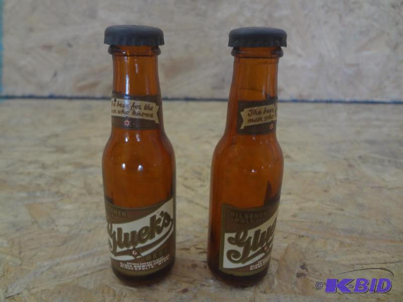 lot 133 image: Pair Of Gluek Glass Bottle SaltPepper Shaker...