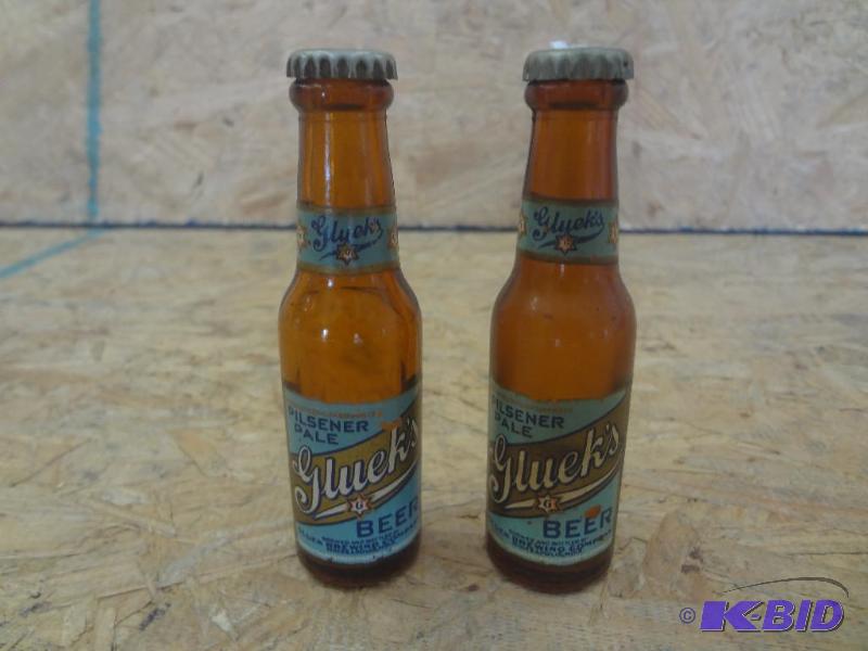 lot 134 image: Pair Of Gluek Glass Bottle SaltPepper Shaker...