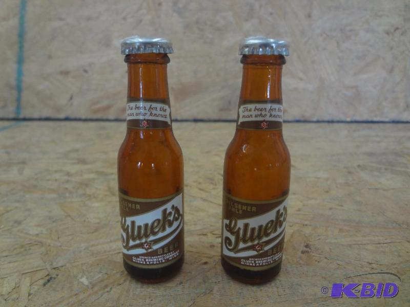 lot 135 image: Pair Of Gluek Glass Bottle SaltPepper Shaker...