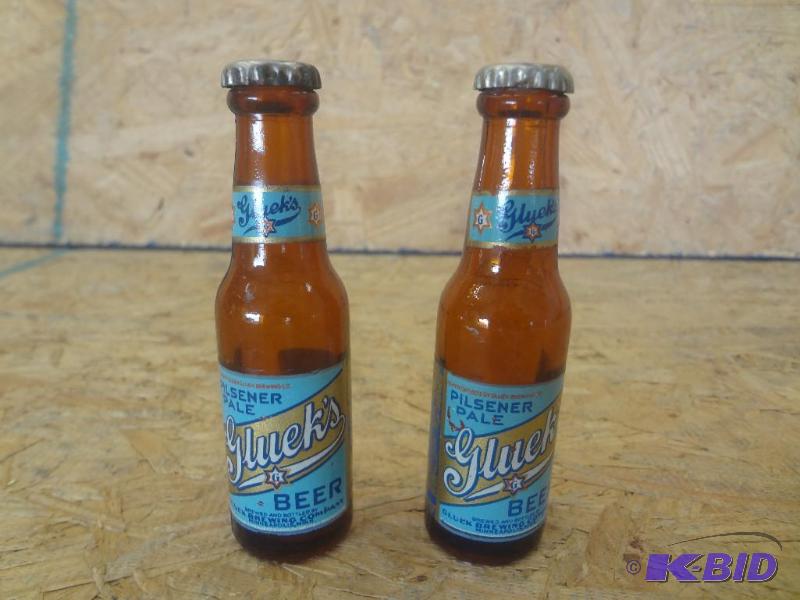lot 136 image: Pair Of Gluek Glass Bottle SaltPepper Shaker...
