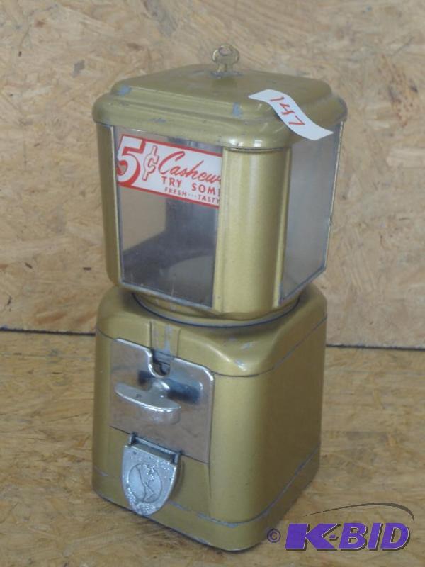 lot 147 image: Vintage 5-Cent Cashew Vendor With Key...