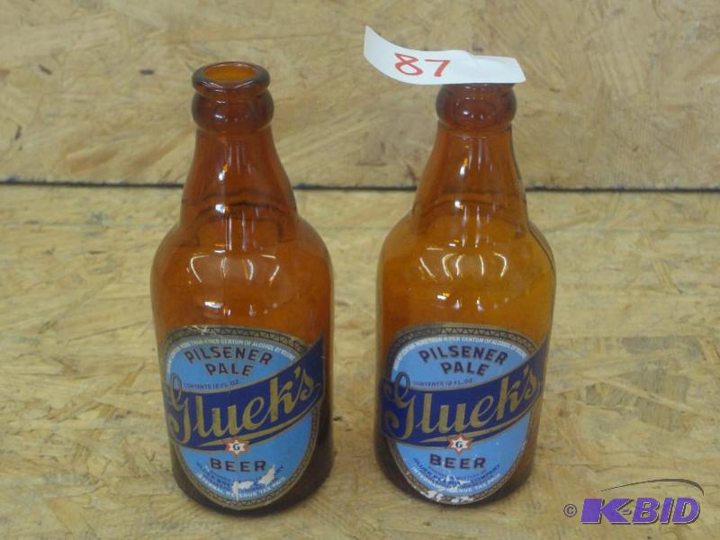 lot 87 image: (2) Gluek Pilsner Ale Beer Bottles...