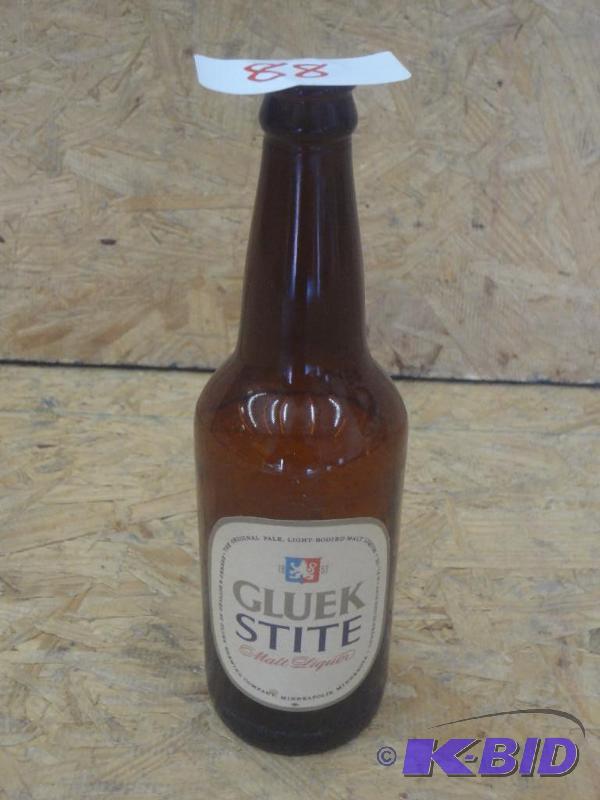 lot 88 image: Gluek Stite Beer Bottle...