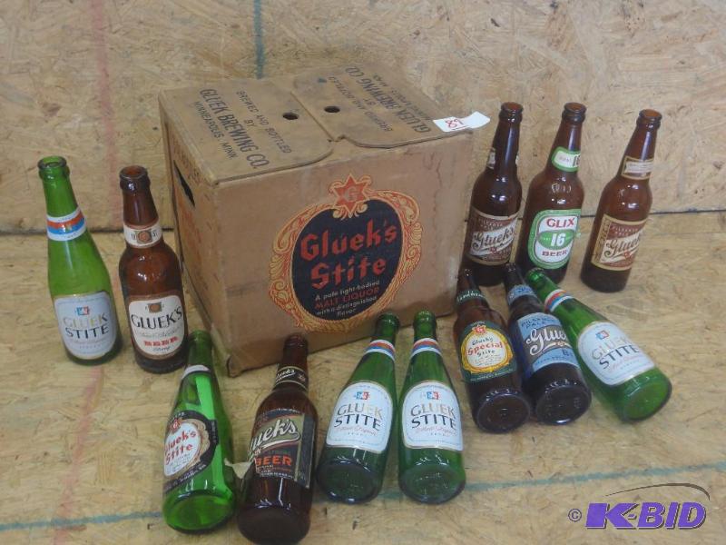 lot 89 image: Gluek Stite Paper 12-Pack Case With (12) Glue...