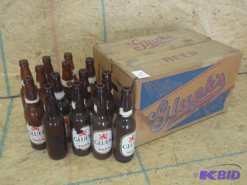 lot 92 image: Gluek Beer Paper 24-Pack Beer Case With (14) ...