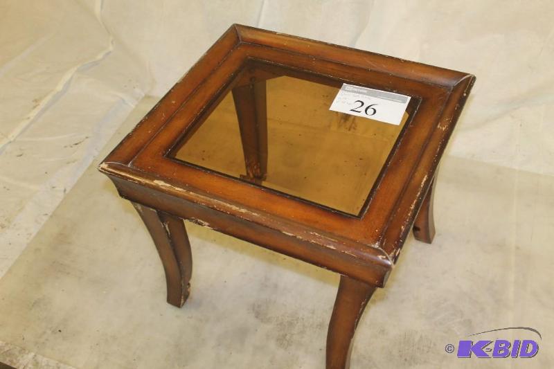 Wooden end table. Glass top. Not stable needs...