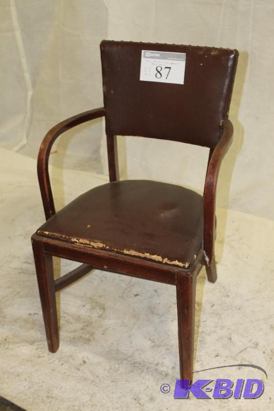 Brown Armchair w vinyl seat and back. Phoeni...