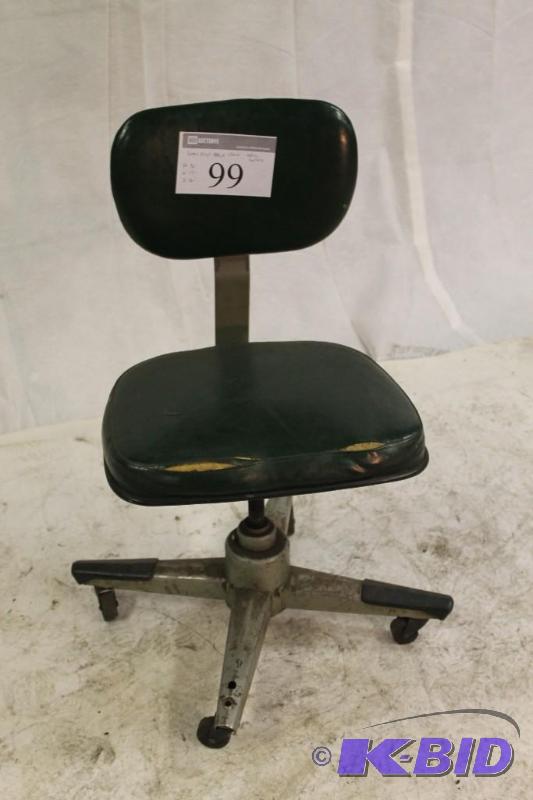 Green vinyl Metal frame rolling office chair....