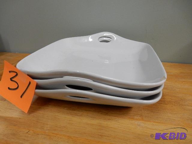 12in x 13in handled serving trays.. One has a...