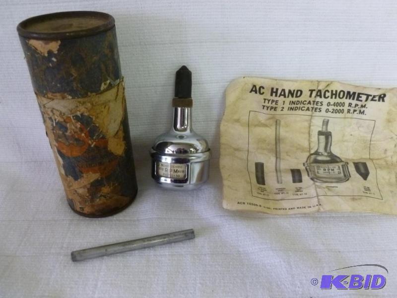 lot 104 image: Vintage AC Spark Plug - Hand Tachometer, good...