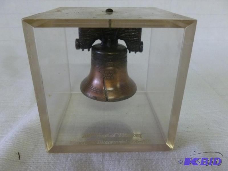 lot 12 image: Collectible Union National Bank brass liberty...
