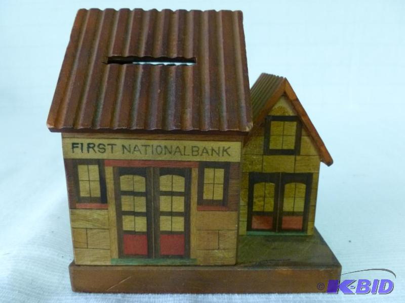 lot 13 image: Vintage First National Bank wooden house coin...