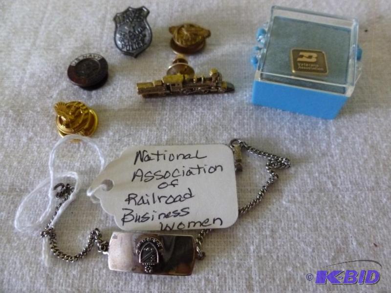 lot 164 image: This lot consists of several hat or jacket bu...