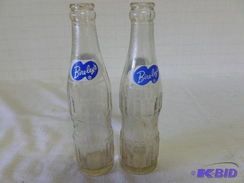 lot 199 image: Lot of two vintage Bireleys embossed glass s...