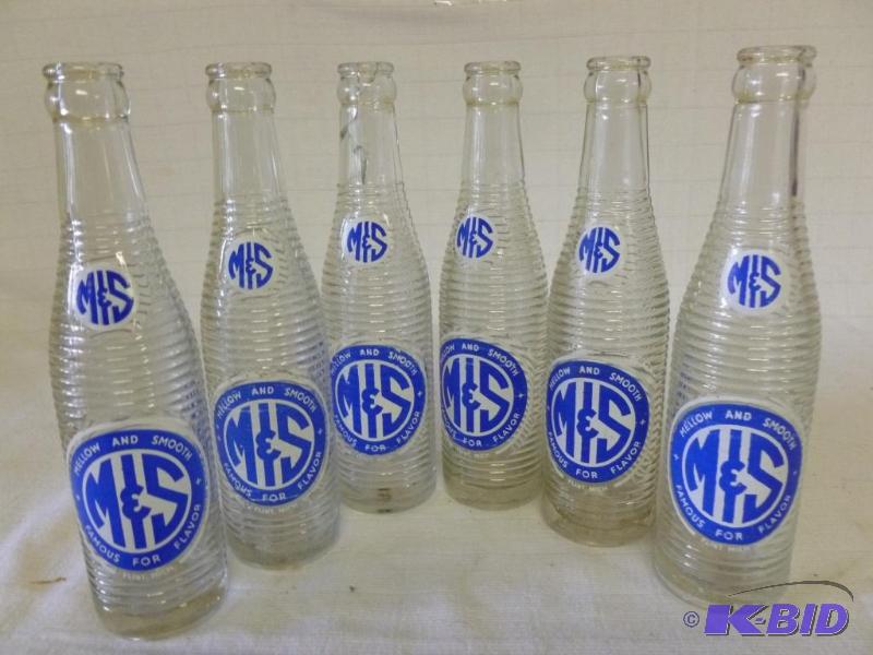 lot 201 image: Lot of six vintage M & S glass soda bottl...