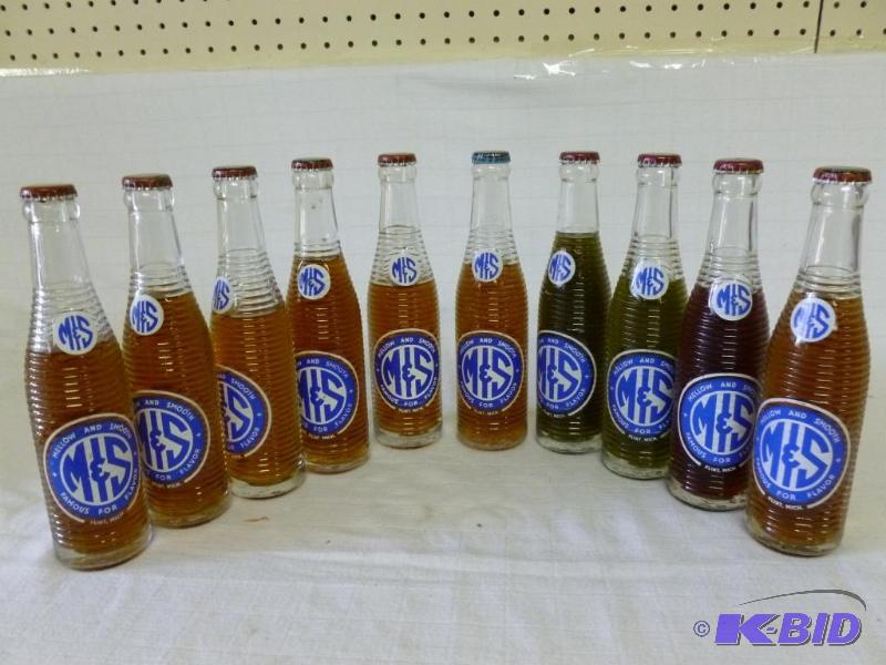 lot 202 image: Lot of ten vintage M & S glass soda bottl...