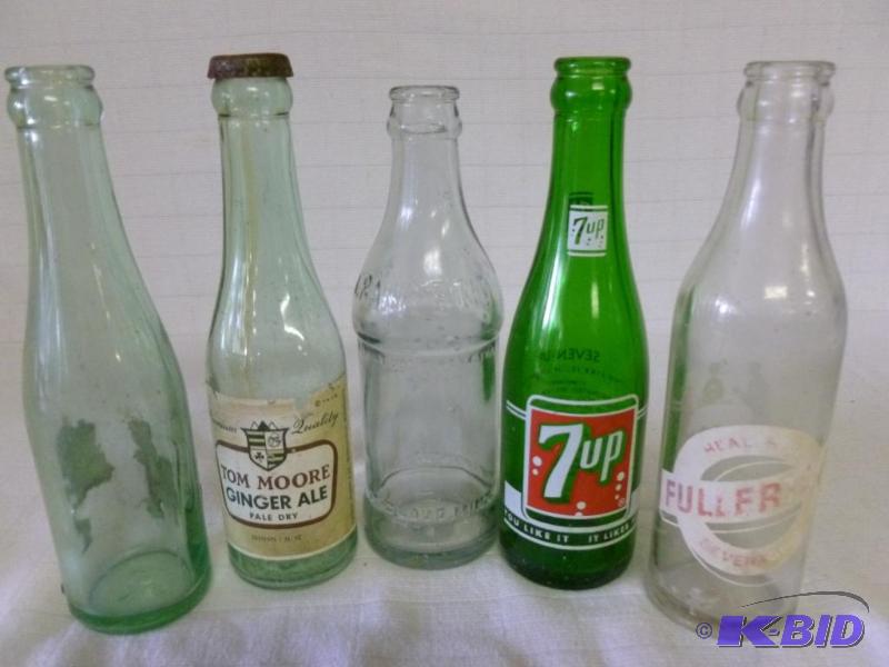 lot 205 image: Lot of five mixed vintage glass soda bottles....