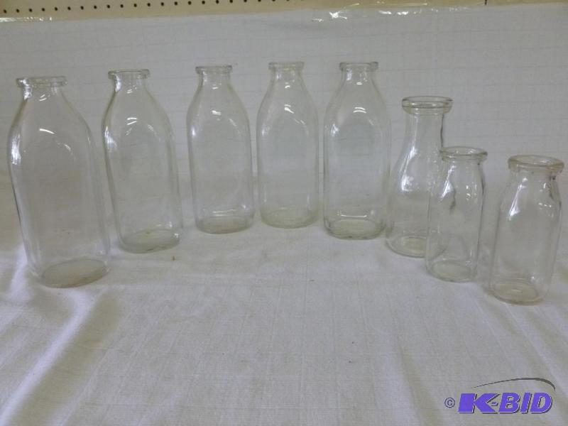 lot 212 image: Lot of eight vintage glass milk jugs, good co...