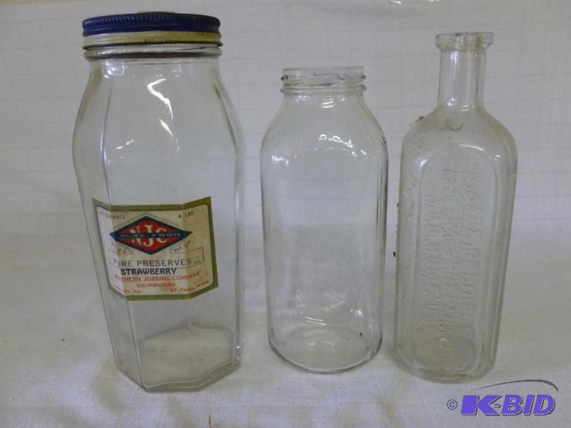 lot 213 image: Lot of three vintage glass product bottles, o...
