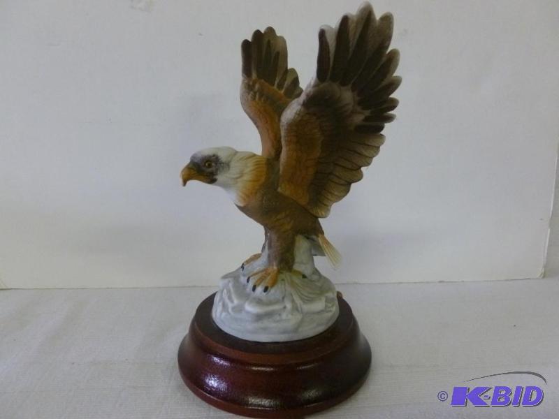 lot 245 image: Porcelain eagle on wood music box decoration,...