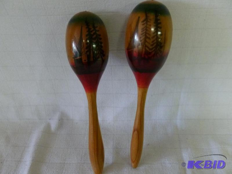 lot 260 image: A pair of wooden maracas that measure 10 14...