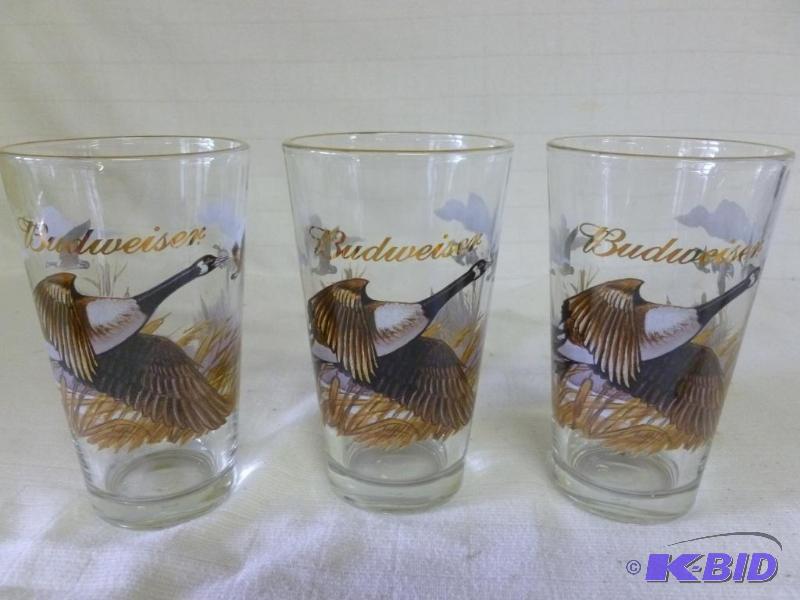 lot 265 image: A set of three matching Budweiser gold plated...