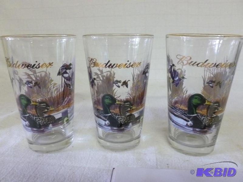 lot 266 image: A set of three matching Budweiser gold plated...