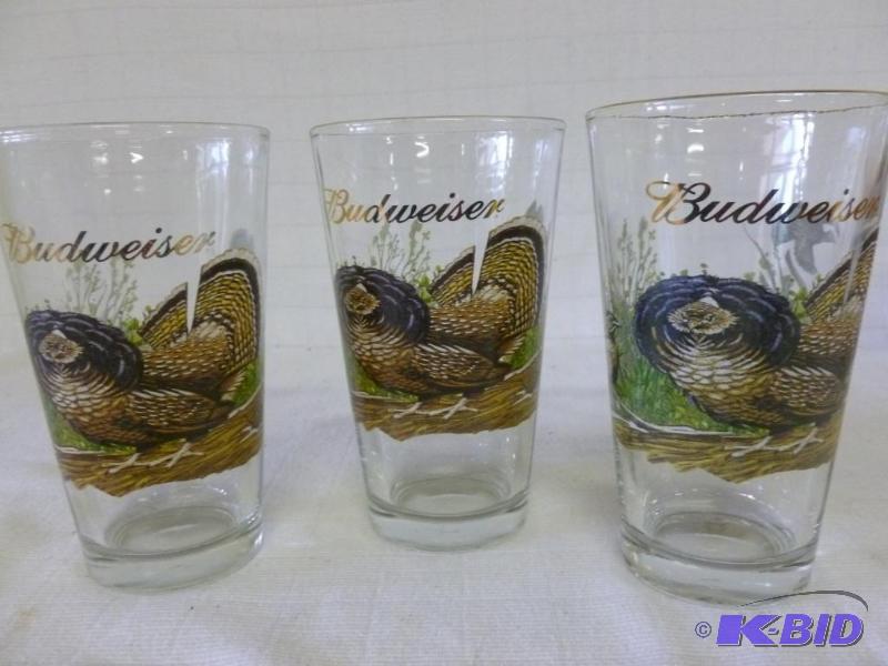 lot 268 image: A set of three matching Budweiser gold plated...