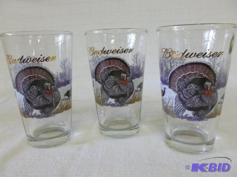 lot 270 image: A set of three matching Budweiser gold plated...