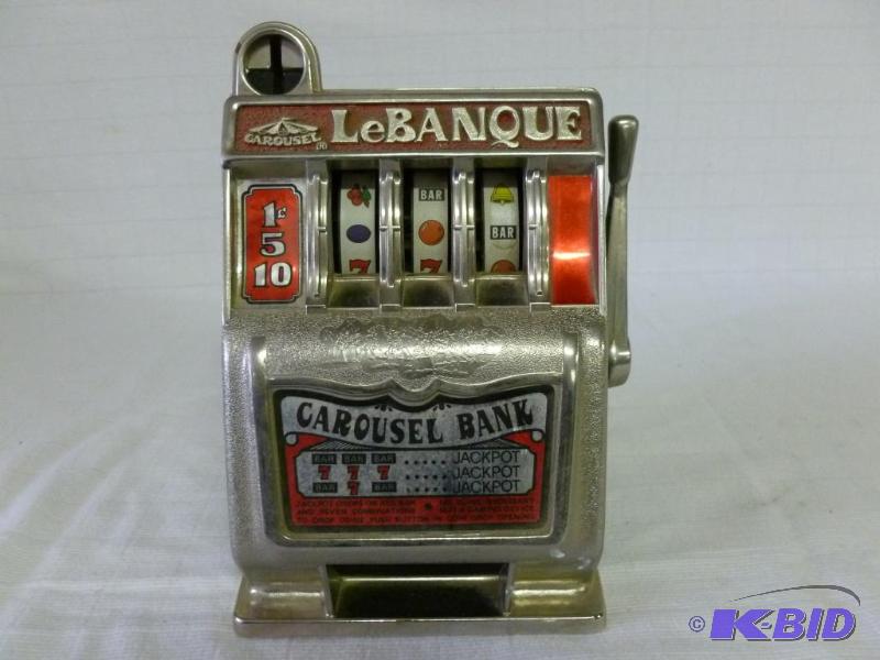 lot 29 image: Collectible LeBanque Carousal Bank tabletop s...