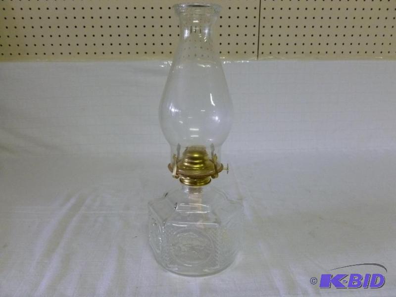 lot 31 image: Large Lamplight Farms embossed glass oil lamp...